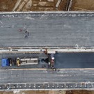 На мосту через Каму на дороге в обход Нижнекамска и Челнов уже укладывают асфальт (фото)