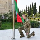 Алиев поднял флаг Азербайджана в бывшей столице Нагорного Карабаха