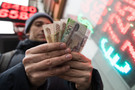 Банки предупредили о возможной передаче коронавируса через деньги