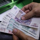 Россия начала выплаты по 10 тысяч рублей пенсионерам и бюджетникам Украины