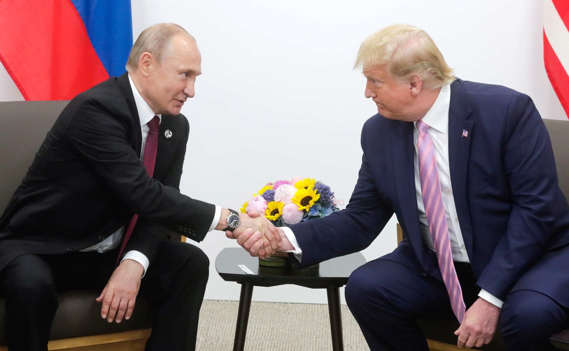 Владимир Путин и Дональд Трамп в 2019 году