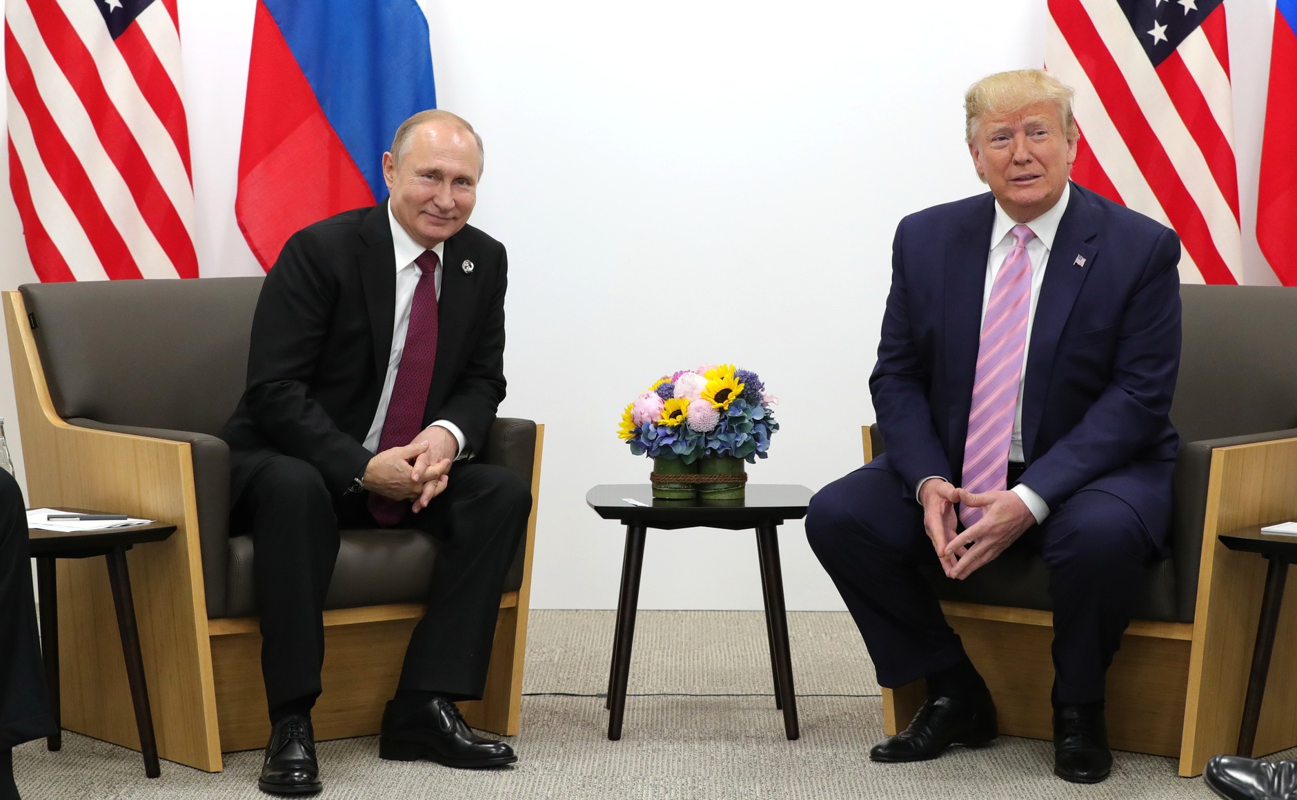 Владимир Путин и Дональд Трамп в 2019 году